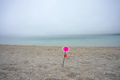 青森の恐山の極楽浜と風車